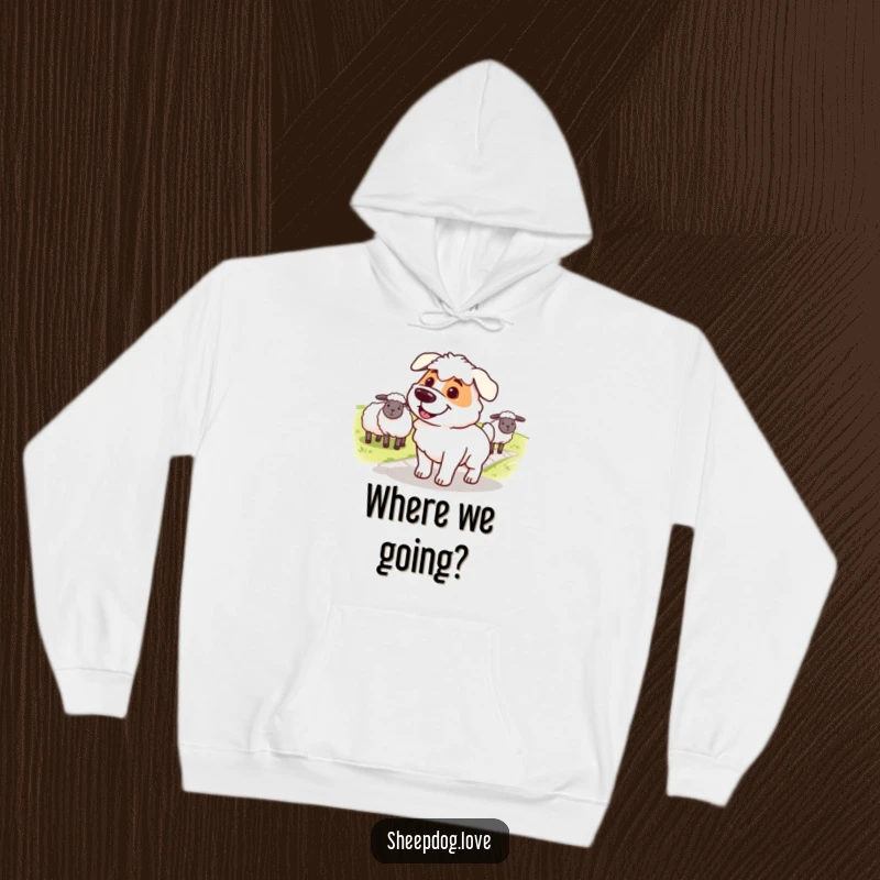 Funny sheepdog hoodie, a smiling dog with a determined look, leading sheep across a path with focus and care.