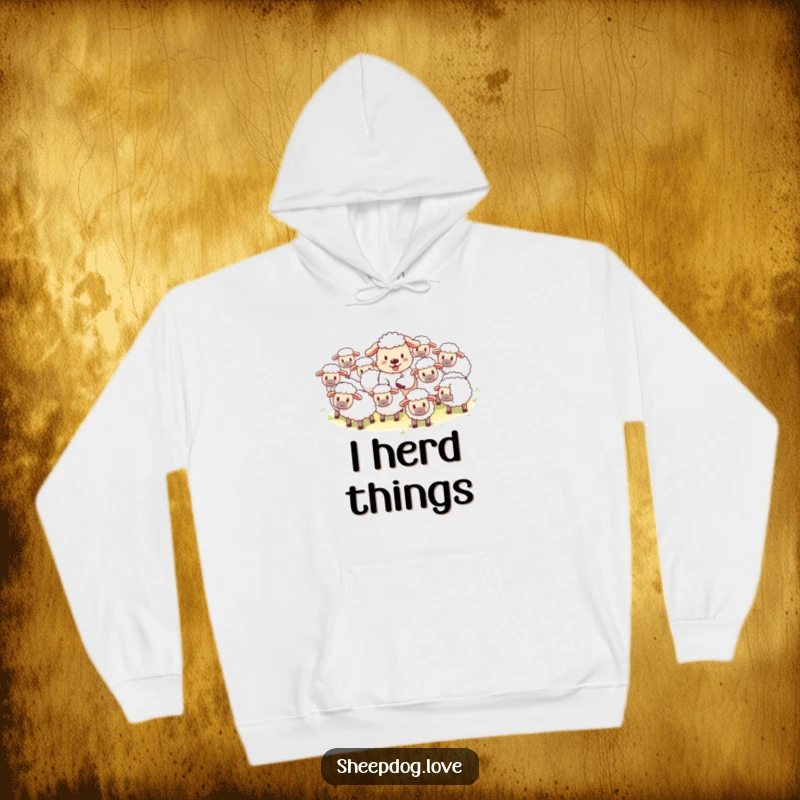 Funny hoodie featuring a playful sheepdog expertly herding fluffy sheep, capturing a heartwarming and humorous scene.