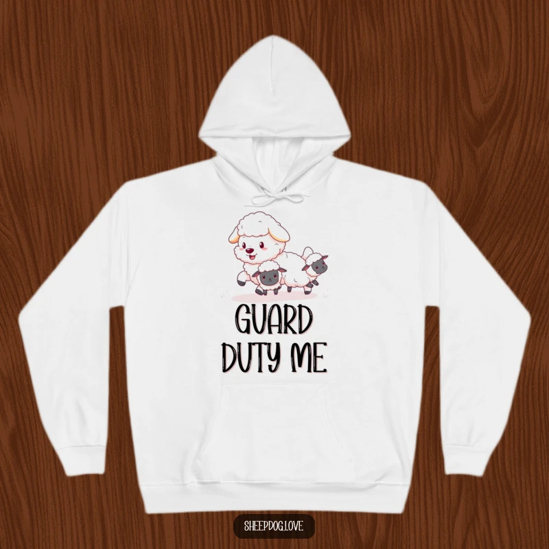 Funny Sheepdog Hoodie: A cuddly, fluffy sheepdog playfully nudging tiny, bouncing sheep in a heartwarming scene.